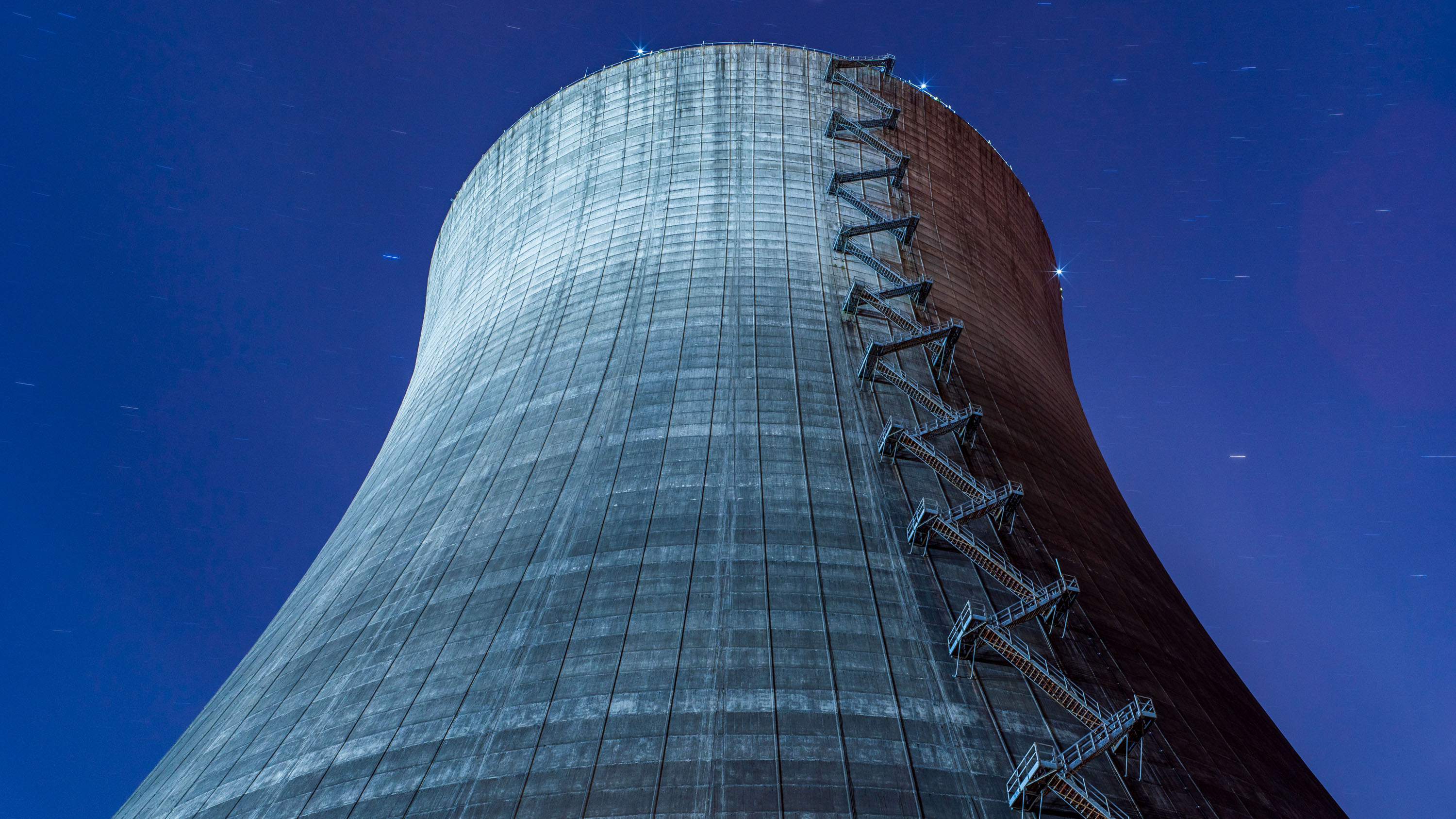 looking up the staircase on the cooling tower of Satsop Nuclear Power Plant in Elma, Washington at night.